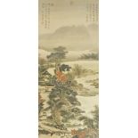A 20thC Chinese painting on silk, depicting a mountainous landscape with lakes, buildings and figure