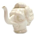 A Fluck & Law novelty pottery teapot, for Carllton ware, in the form of a caricature of Margaret Tha
