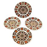 Four Royal Crown Derby Old Imari pattern porcelain plates, three 21.5cm diameter, and the other 23cm