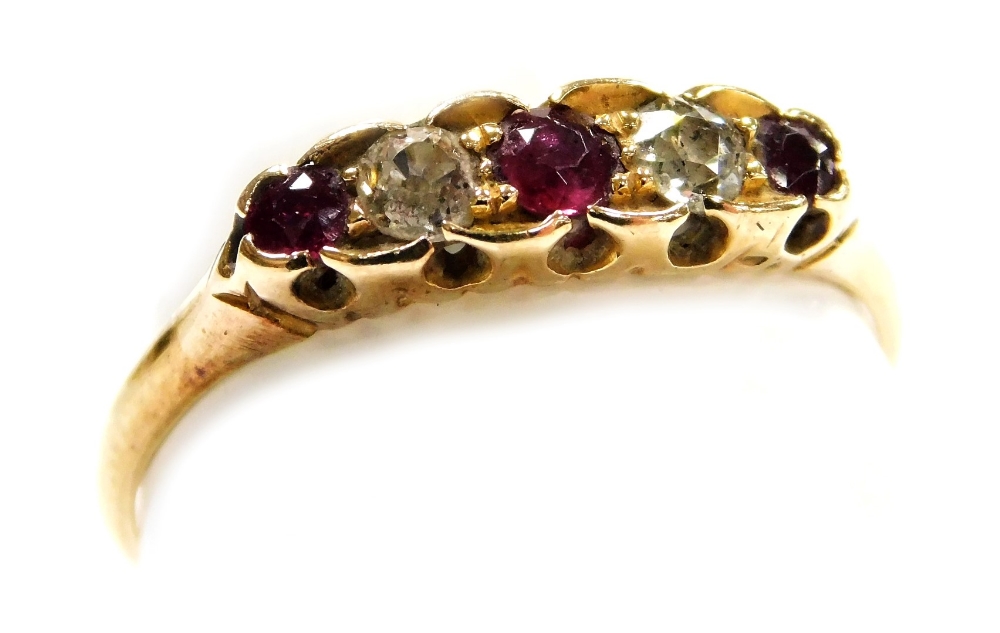 A Victorian gold diamond and ruby five stone ring, the shank internally engraved and dated 1888, siz