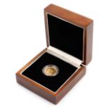 A George V full gold sovereign, dated 1925, 8g, boxed, with outer packaging.