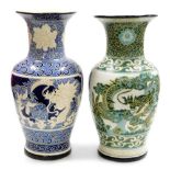 Two modern Chinese pottery baluster vases, with sgraffito dragon and flower head decoration, 52cm hi