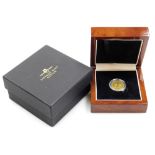 A George III gold full sovereign, dated 1820, 7.7g, in fitted box with outer packaging.