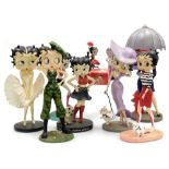 Seven Betty Boop plastic figures, to include Shake What Your Mumma Gave Ya!, Betty Boop in camouflag