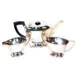 A George VI silver three piece tea set, each piece of tapering angular form, maker TL, Sheffield 193