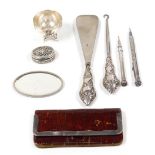 A group of small silver, to include a Victorian silver handled shoe horn and button hook, two propel