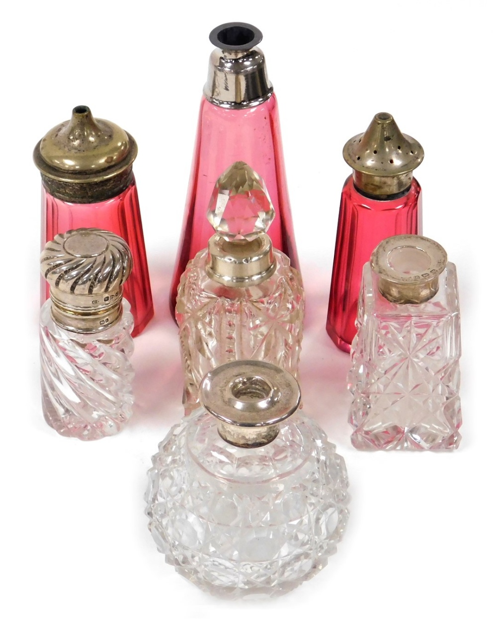 A group of Victorian and later glass and silver mounted scent bottles, to include a Victorian scent