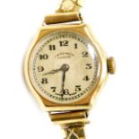 A JW Benson of London 9ct gold cased lady's wristwatch, circular silvered dial bearing Arabic numera