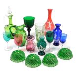 A group of Victorian coloured glassware, including Mary Gregory type vases, green glass rummer, pale