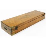 A 19thC oak cased and brass mounted J Purdey gun case, the hinged lid enclosing a green felt fitted