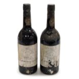 Two bottles of vintage 1974 Smith Woodhouse and Co Port, late bottled 1978.