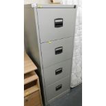 A metal four drawer filing cabinet, 133cm high, 47cm wide, 64cm deep.