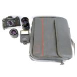 A Praktica BC1 camera, Carl Zeiss Jena 3.5-135 lens, Praktica Pentacon 1-2.8 lens, Vivitar flash, et