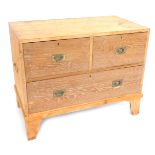 A limed oak and pine military chest, with pair of brass carrying handles, having two deep and one lo