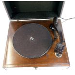 A His Masters Voice cased portable record player, 15cm high, 38cm wide, 35cm deep. WARNING! This