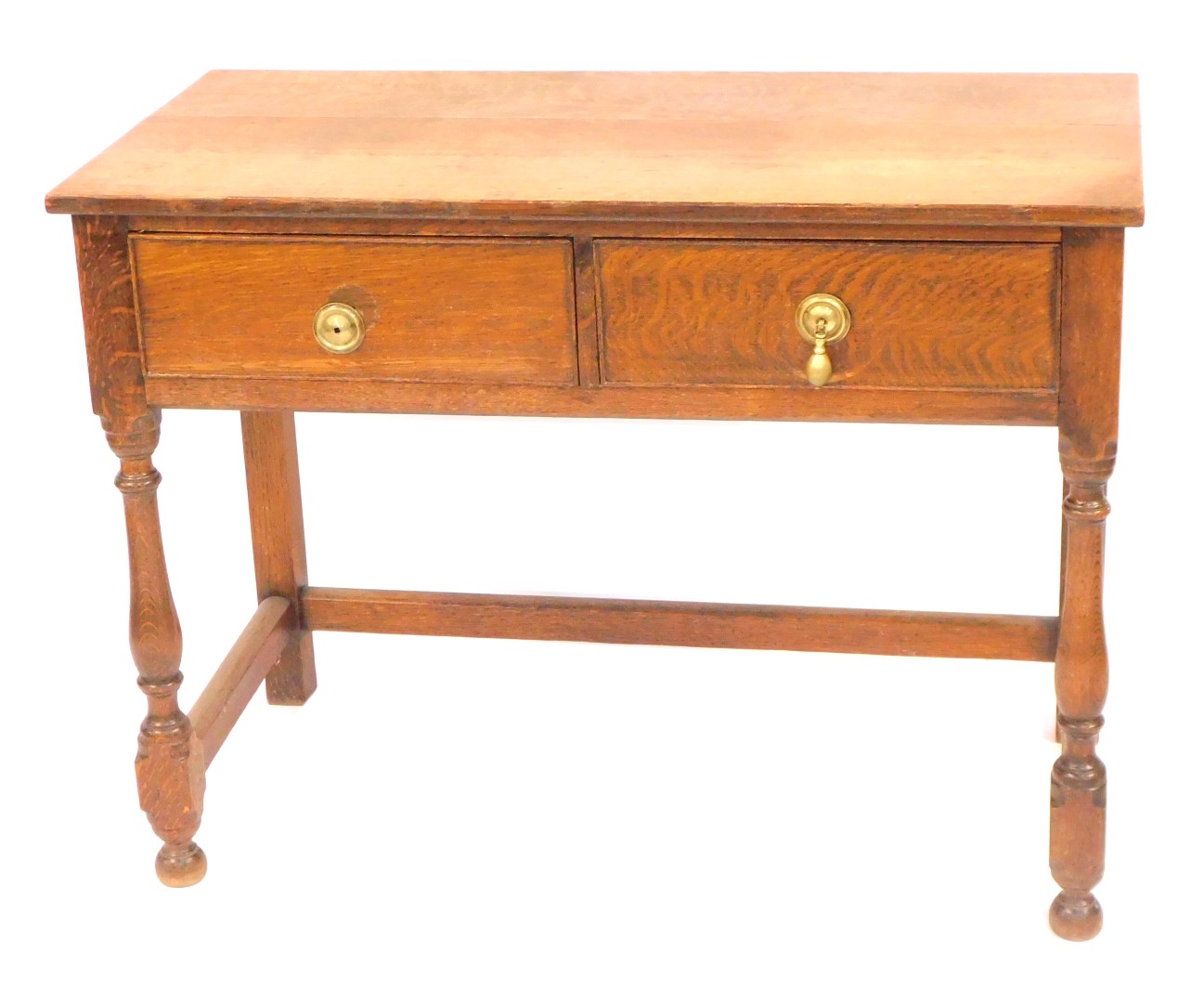 A Victorian oak side table, with two frieze drawers, raised on baluster turned columns united by str