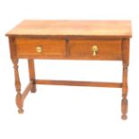 A Victorian oak side table, with two frieze drawers, raised on baluster turned columns united by str