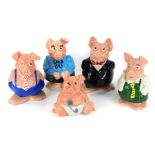 Five Wade Natwest pigs, comprising mother, father, daughter, son, and baby, each with stopper.