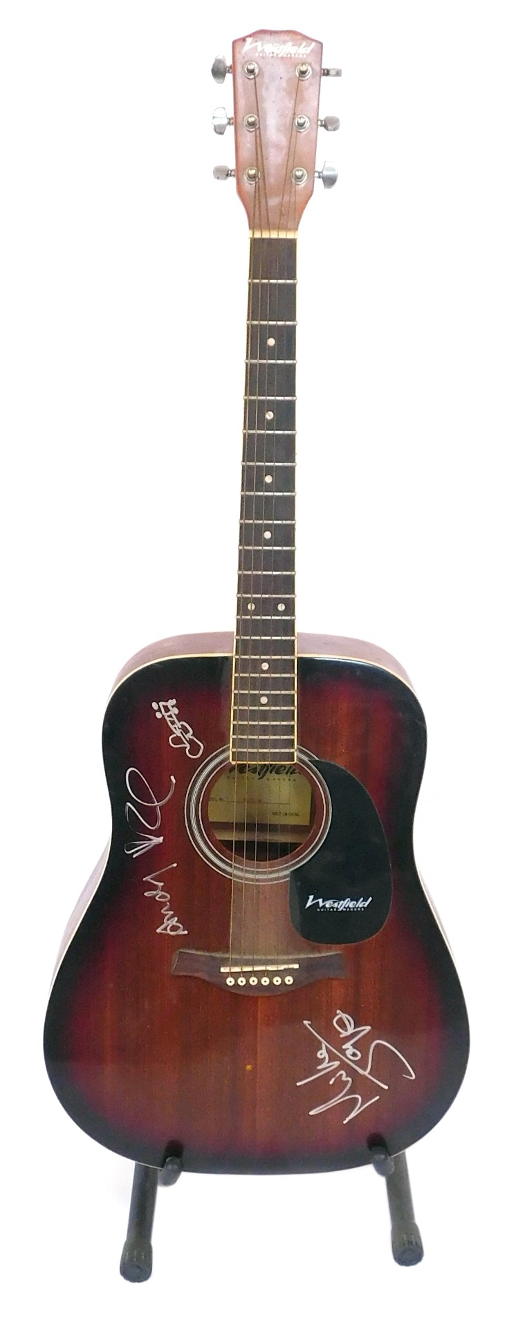 A Westfield guitar, model B200-SB, on guitar stand, with silver marker signatures relating to The Sm