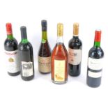 Six bottles of assorted wine, comprising a Marques de Caro Tinto Reserva 1991, limited edition bottl