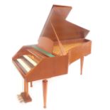A 1960s William de Blaise teak cased harpsichord, with rosewood and white plastic keys, with tuning