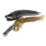 A Middle Eastern Kukri, with curved blade, on an ebony mother of pearl inlaid handle, with two minia