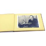 An autograph book, containing a black and white photograph of Harry Corbett and Sooty, with ink dedi