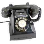 A GPO vintage black cased telephone, with call exchange Enfield 7665.