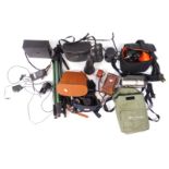 A group of camera and optics equipment, comprising a Canon Video Recorder, Tohyoh 30x70 binoculars,