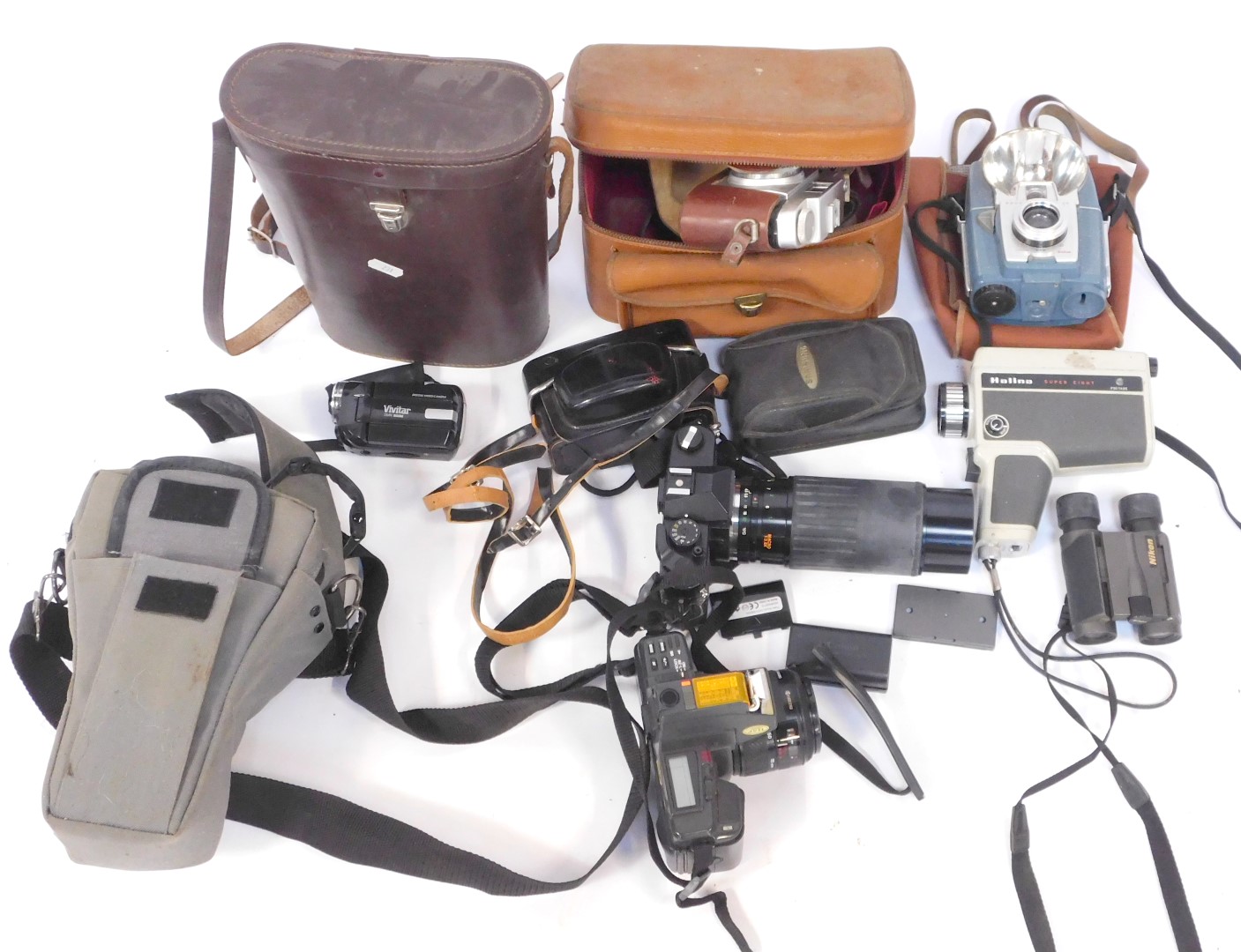 A group of camera equipment, comprising Samsung, Halina Super 8, Vivitar DVR 908M, Kodapak 126, Yash