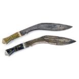 Two Eastern Kukris, each with a curved blade and horn handle, one black, one brown, with inlays and