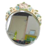 An early 20thC Barbola dressing table mirror, the arched floral top with pansies and daisies, with c