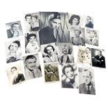 A collection of 1960s, 1970s, and 1980s black and white film star photographs, bearing printed signa