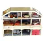 A Lundby doll's house, the house with a tiled roof, and glazed window panels with balcony and lower