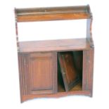 A Victorian mahogany hanging cupboard, with a raised gallery top, above single shelf with two cupboa