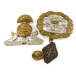 A group of military related cap badges, comprising an Egypt Lancashire Fusiliers cap badge, a South