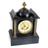 A Victorian black slate mantel clock, with a domed and turreted gilt top, with two column supports,