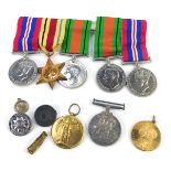 WWI and WWII medals, comprising Great War and Victory medals, named to Pte C W Rawden, Lincolnshire