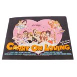 A 1970s film poster Carry On Loving, 75cm x 102cm. Mike Bell was a prolific artist of film posters