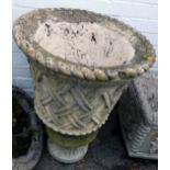 A 19thC reconstituted stone planter, the planter with cross hatched design, on a small circular base