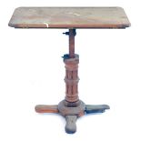 A Victorian mahogany draughtsman's table, with adjustable rectangular top, on a shaped and moulded f