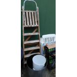 A wooden step ladder, a large stainless steel plant pot, home-brew beer barrel, Black and Decker