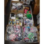 A quantity of headphones, in-ear and over-ear. (6 boxes)