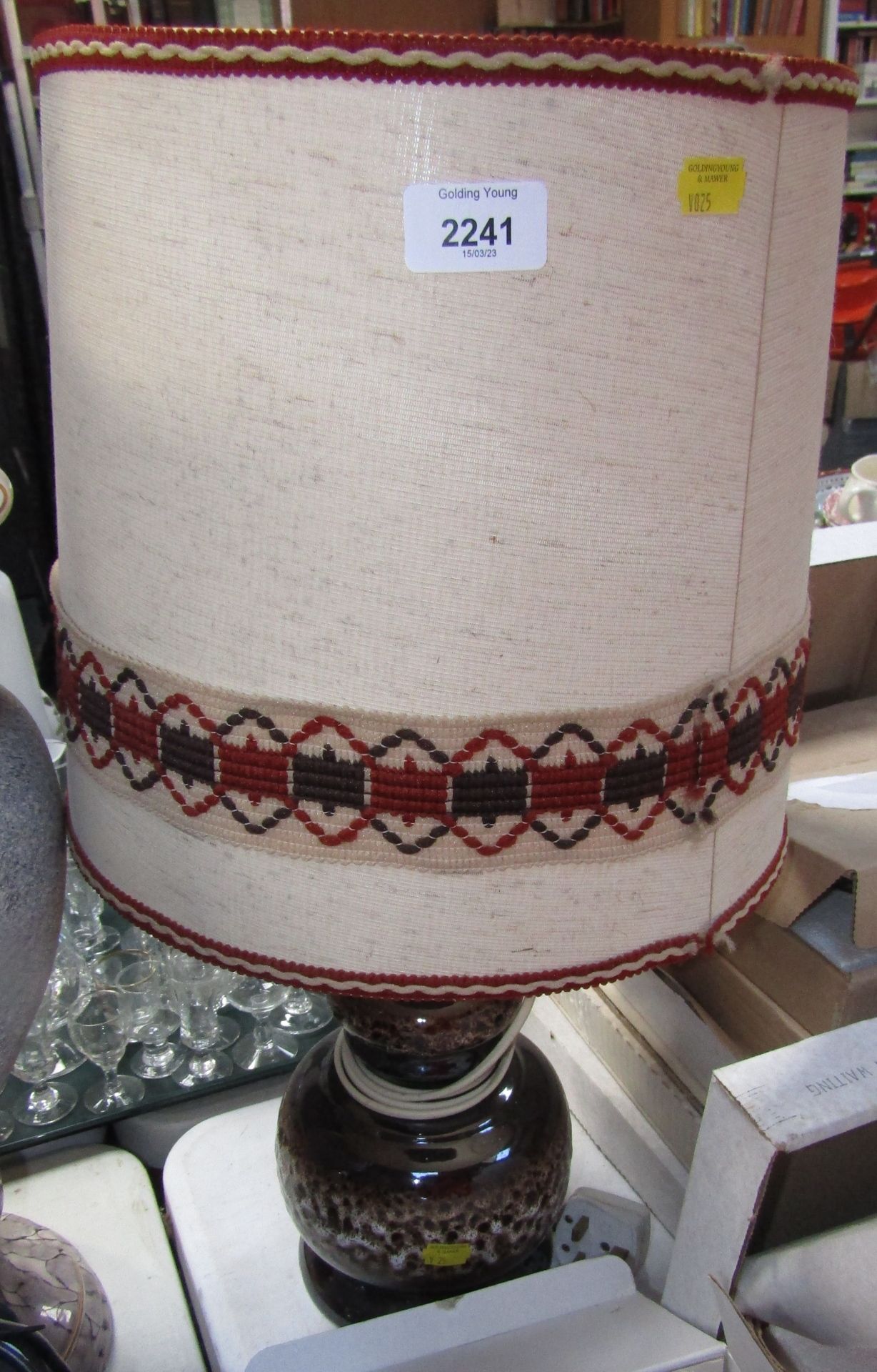 A West German style brown mottled table lamp, with an embroidered shade. (AF) WARNING! This lot