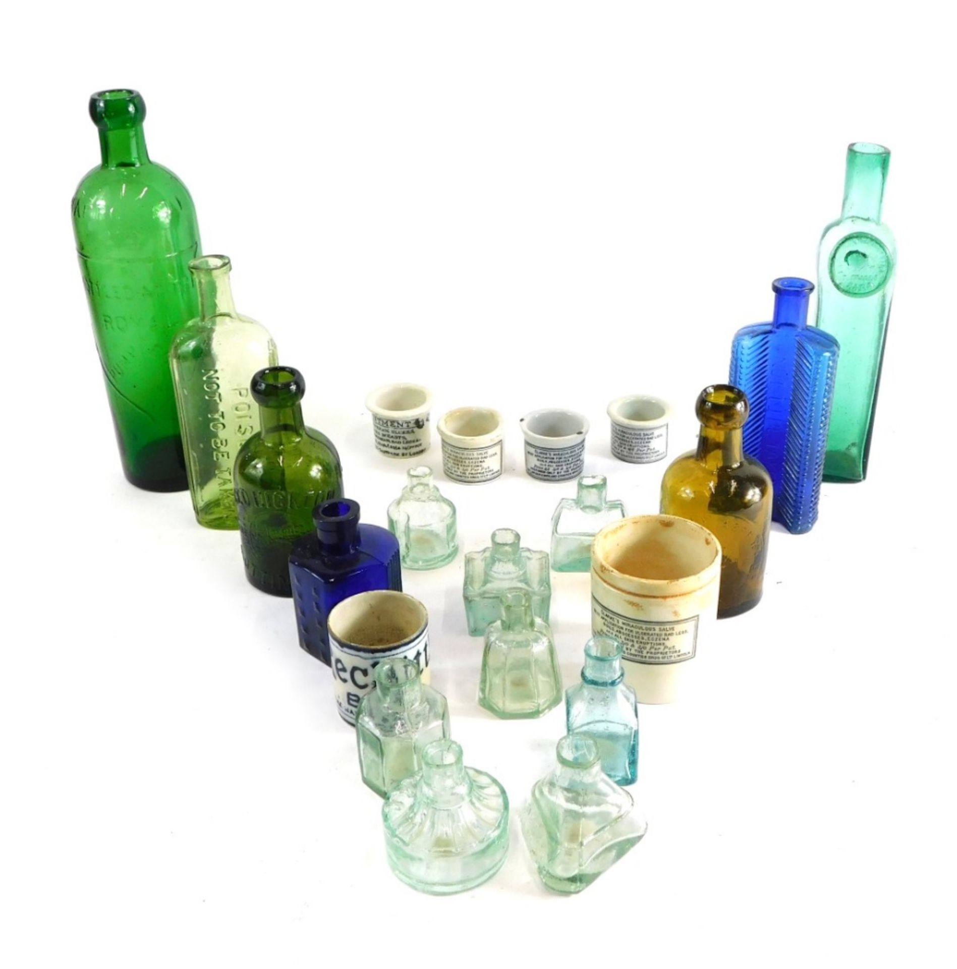 Various glassware, green glass bottle, a Clarke's Miraculous Salve jar, inverted blue glass poison b