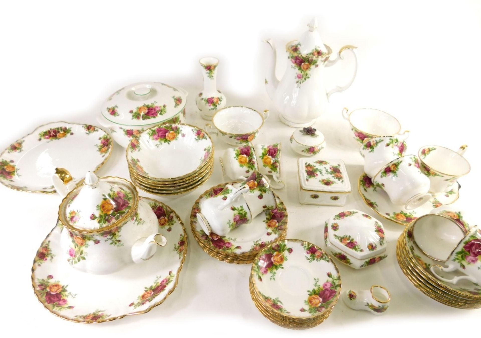 A comprehensive Royal Albert Old Country Roses part dinner service, to include lidded tureen, coffee