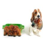 A Royal Doulton figure group gun dog and pheasant, number 1028, printed marks beneath, 15cm high, an