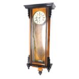 A late 19thC walnut and ebonised Vienna wall clock, the 19cm diameter fancy Roman numeric dial with