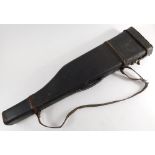 A black leather leg of mutton gun case, with strap.