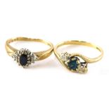 Two dress rings, comprising of a 9ct gold aquamarine and diamond twist ring, ring size N½ and a 9ct